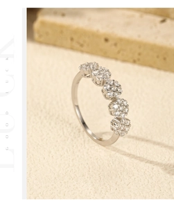 Detailed view of S925 sterling silver flower ring with sparkling round cubic zirconia