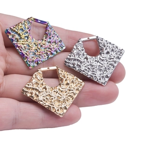Hammered diamond-shaped stainless steel charms in rainbow, silver, and gold finish