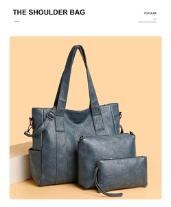 Three-piece dark blue large capacity tote bag set with matching inner pouch and clutch