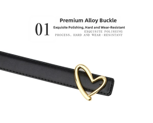 Close-up of polished gold heart-shaped alloy buckle on a sleek black leather belt