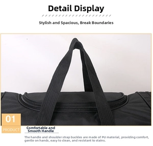 Close-up of durable PU leather handles and reinforced stitching on a black nylon travel bag