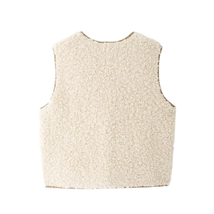 Gilet chic en peau de mouton crème pour femme avec bordure marron et détail de lien au dos