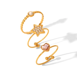 Three-piece gold adjustable ring set featuring pink heart, star, and white zircon details