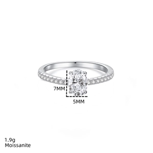 Macro detail of oval cut moissanite ring with precise 7mm by 5mm dimension specs