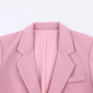 Pink oversized blazer for women with notch lapel detail on high-quality wool-like fabric