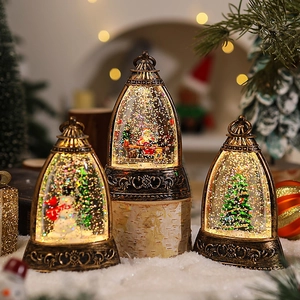 Vintage bronze Christmas lantern with Santa and snowman scenes on white snow