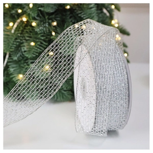 Detail of silver mesh ribbon with gold trim for Christmas DIY tree decorations