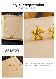 Detail of gold flower jewelry set featuring matte finish petals and central zircon stones