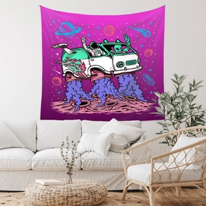 Creative astronaut space bus tapestry in purple tones hanging above a beige fabric sofa