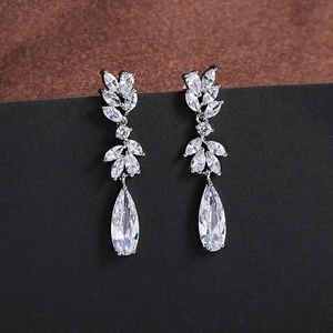 Close-up of S925 silver pear-cut zircon teardrop earrings with marquise leaf accents