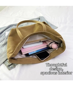Top view of spacious canvas tote bag interior showing large capacity for daily essentials