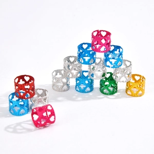 Colorful hollow metal hair tubes for braids with heart and cross patterns in bulk