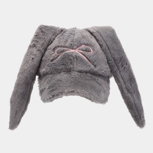 Detailed close-up of grey plush bunny ear hat featuring pink embroidered bow and soft fur