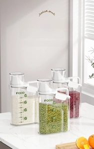 Macro view of 1800ml transparent airtight food storage containers with measuring lids