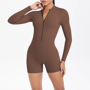 Detail of front zipper and stand collar on a chocolate brown fitness bodysuit