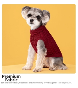 Close-up detail of red cable-knit pet sweater showing high-neck sleeveless texture