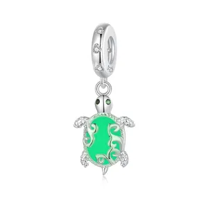 Luminous S925 sterling silver sea turtle charm with green glow in the dark shell