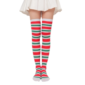 Detail of Christmas striped thigh high socks featuring plush bow and festive patterns