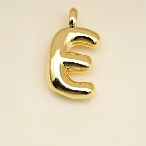 Polished gold bubble letter E pendant necklace charm with reflective mirror finish