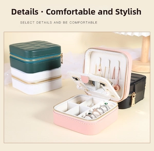Detail view of portable PU leather travel jewelry box with mirror and ring slots
