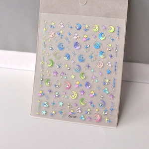 Detailed 3D embossed moon and star nail art stickers with macaron colors and tiny rhinestones