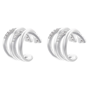 Detail of silver multi-layer ear cuffs with cubic zirconia inlay and polished finish