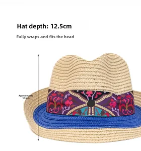 Detail of 12.5cm deep beige straw fedora with blue trim and bohemian patterned band
