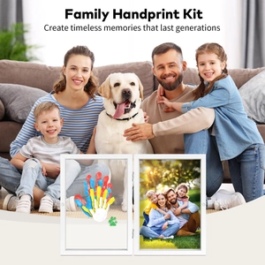 Detail of white double-fold wooden frame for family handprints with colorful molds