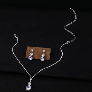 Sparkling silver cubic zirconia flower bridal necklace and drop earrings jewelry set