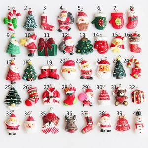 Assortment of 40 Christmas resin charms featuring Santa, tree, and reindeer designs