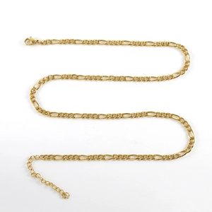 Close-up of gold stainless steel Figaro chain showing lobster clasp and link texture