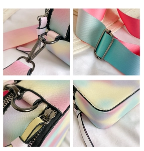 Detail of gradient PU leather bag showing metal hardware, zipper and wide shoulder strap