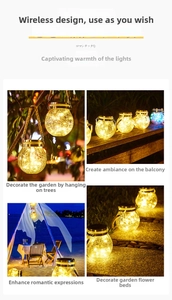 Solar crackle glass jar lantern with warm LED string lights for garden and patio decor