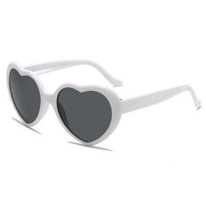 White heart-shaped sunglasses with dark lenses shown from a professional side angle