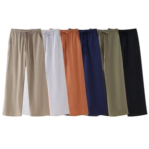 Wide-leg linen lounge pants with drawstring waist shown in multiple earthy colors