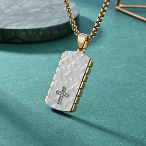 Mechanical gear style mens pendant with bark texture and cross detail on gold box chain