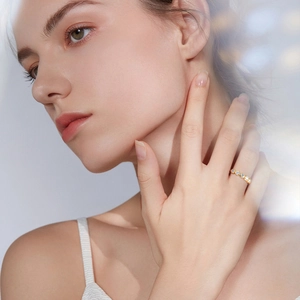 Elegant gold S925 silver ring with Moissanite stone pavé setting worn by model