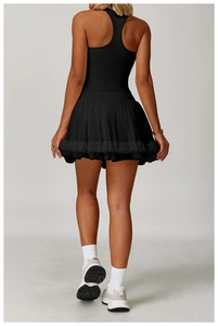 Rear view of black racerback tank top and pleated tennis skirt for yoga and fitness