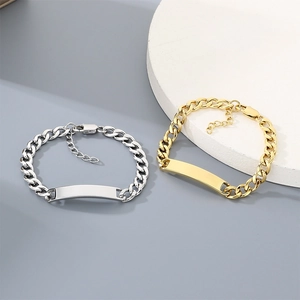 Detailed view of gold and silver cuban link titanium steel bracelets with customizable plates