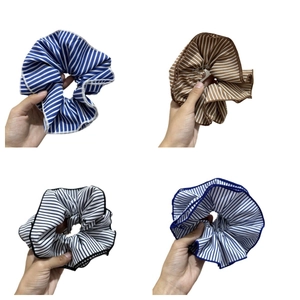 Blue and brown striped fabric scrunchie set for elegant ponytail or bun hair styling