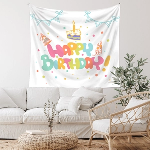 Detail of white Happy Birthday tapestry with colorful cake and party elements for wall decor