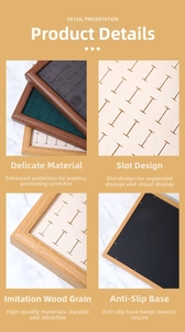 Detailed view of wood texture jewelry tray with velvet slots and anti-slip base