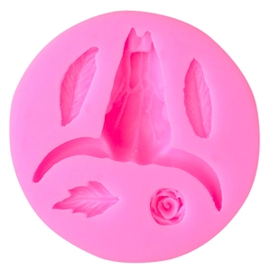 Pink silicone mold featuring bull skull, feathers, and rose flower detail for DIY crafts