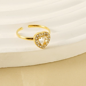 Adjustable 18K gold-plated heart ring with sparkling cubic zirconia on white display