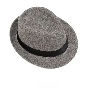Detailed top view of a grey fedora hat with breathable texture and black ribbon band