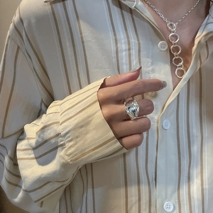 Minimalist S925 sterling silver saddle ring and layered chain necklace on model