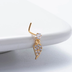 L-shaped gold stainless steel nose stud with a cubic zirconia leaf dangle charm