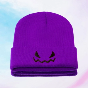 Purple knitted beanie with Halloween pumpkin face embroidery and ribbed fold-over cuff