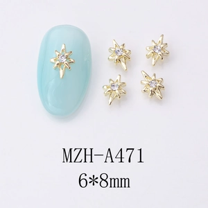 Détail du bijou d'ongle étoile dorée en alliage avec strass brillant de 6x8mm