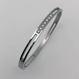 Modern 4mm silver titanium steel hollow bangle with eight inset clear sparkling zircon stones